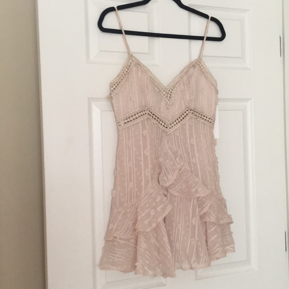 Beige ruffle dress